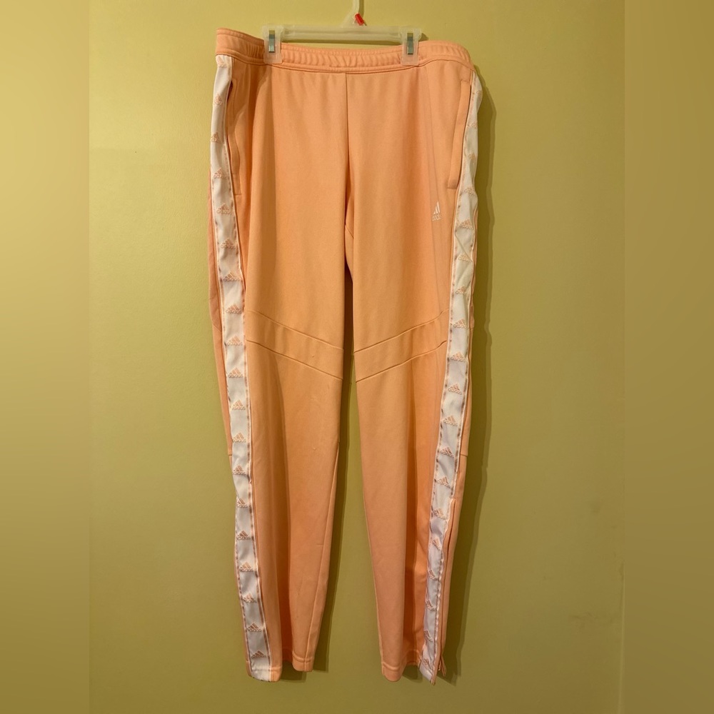 Coral Adidas track pants